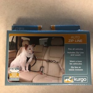 Auto zip line dog restraint